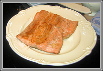 Two seared planks of pink trout